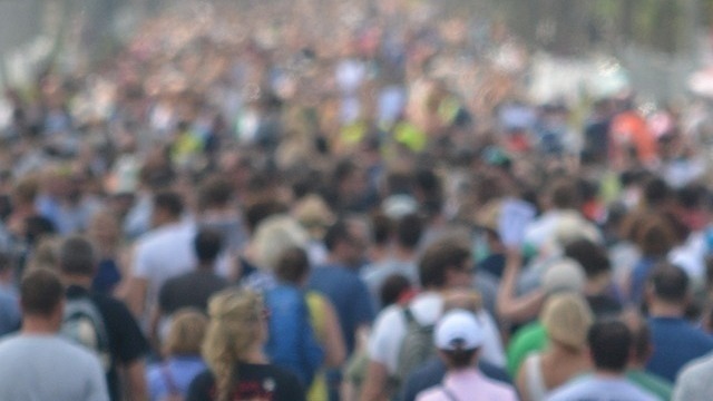 Mass of people walking